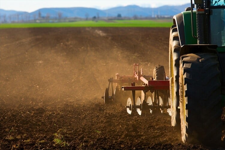 Tractor with Disc / Tillage Attachment