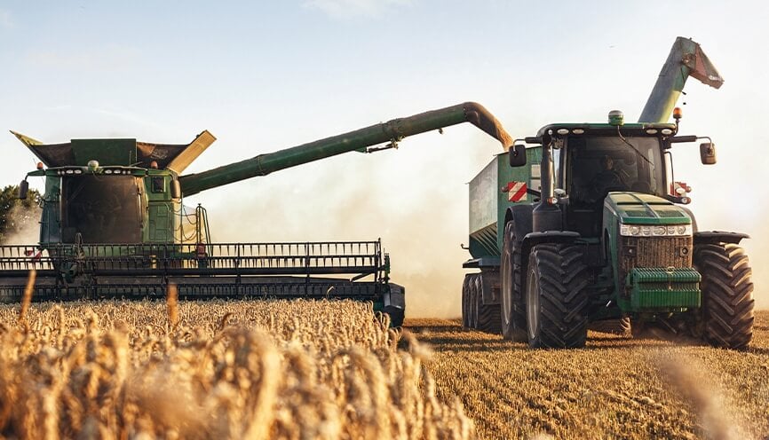 John Deere Combine with Grain Header & Tractor with Grain/Auger Wagon